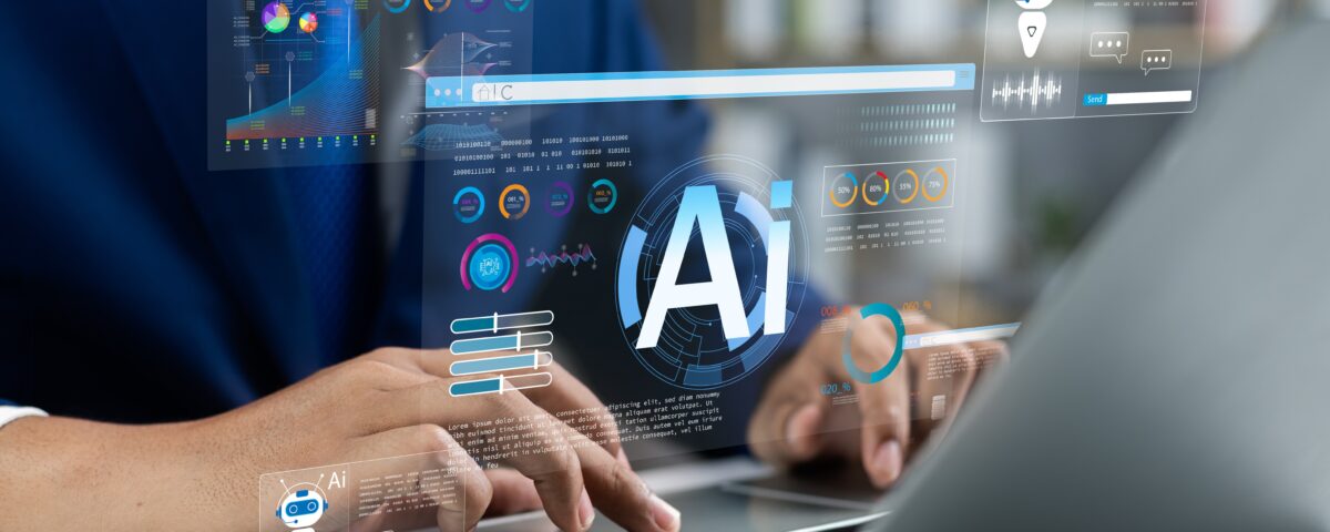 Person using computer, utilizing AI chatbot
