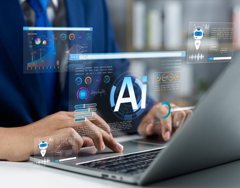 Person using computer, utilizing AI chatbot